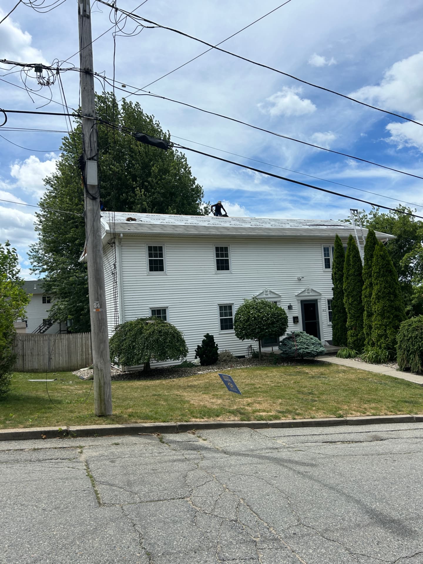 Multi-unit residential building in Rhode Island receiving a new roof system