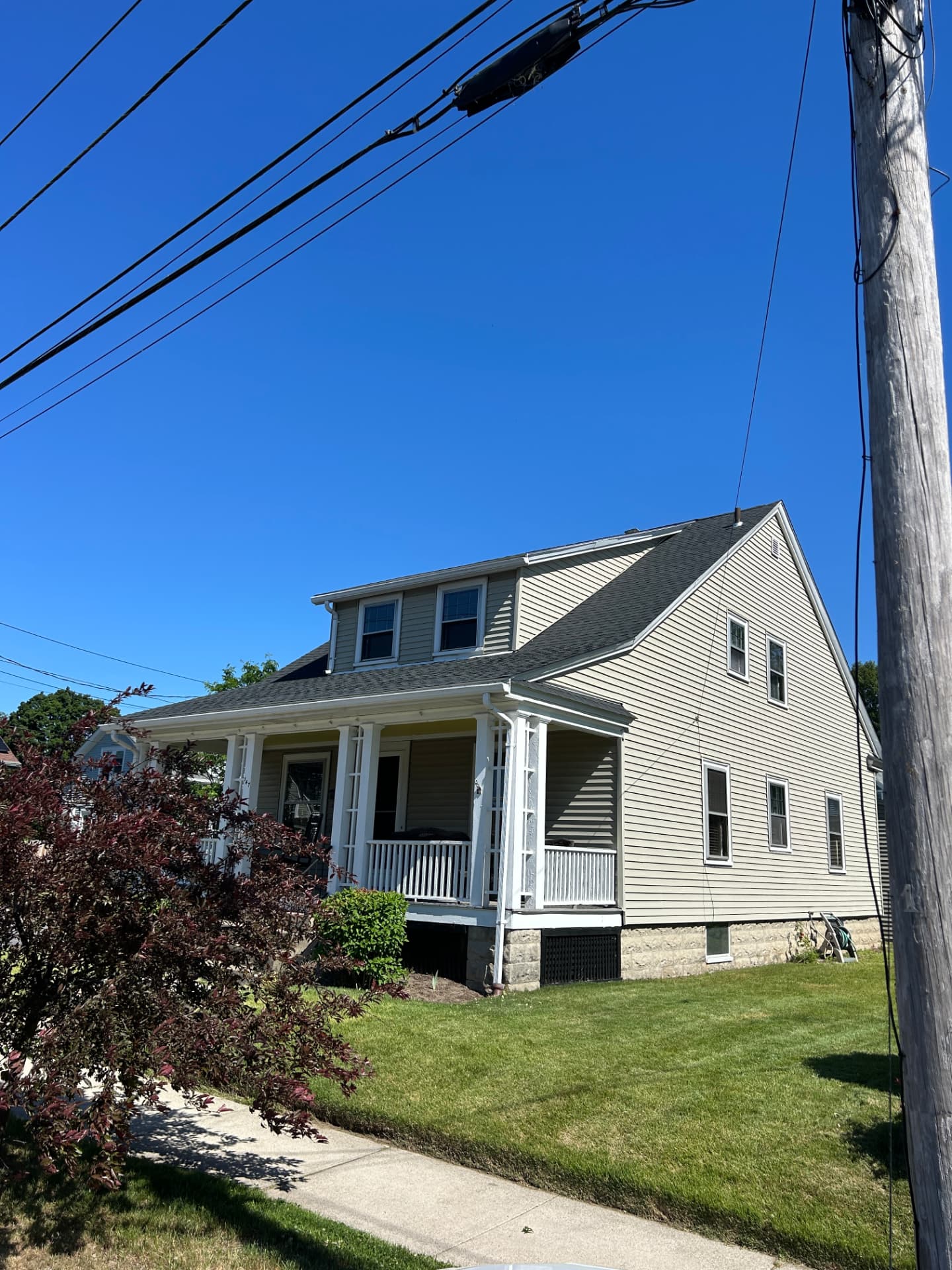 Completed roof replacement on a Rhode Island home by Rhody Roofing & Construction